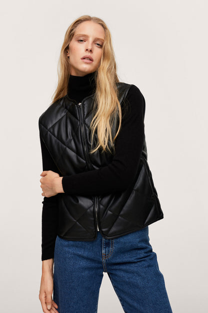 Black quilted zip-front jacket with high neck and long sleeves