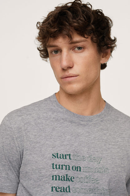 Men's medium heather grey T-shirt with close-up green and blue printed quote