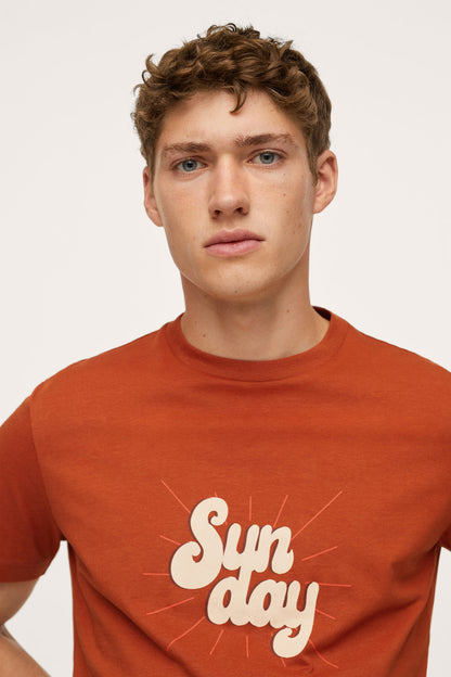 Men's burnt orange T-shirt with 'Sun day' logo graphic close-up