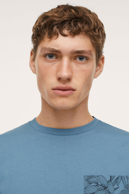 Men's sky-blue crewneck T-shirt with leaf graphic detail at chest