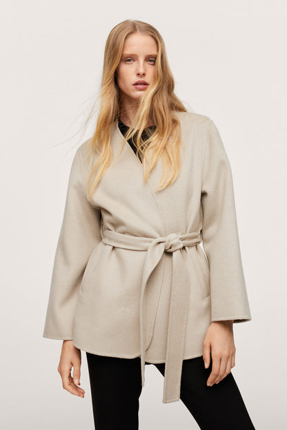 Ecru belted jacket with V-neck and tie waist, full front view