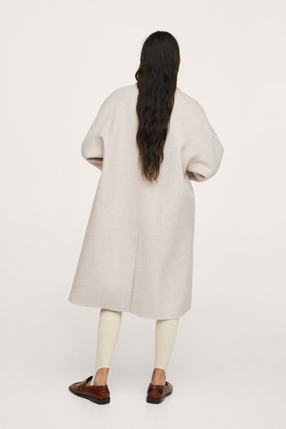 Light pastel gray long overcoat, back view with relaxed sleeves