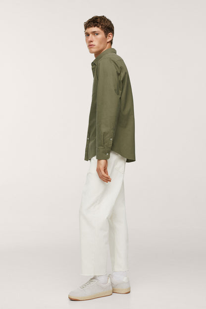 Men's khaki button-up shirt with long sleeves, side profile