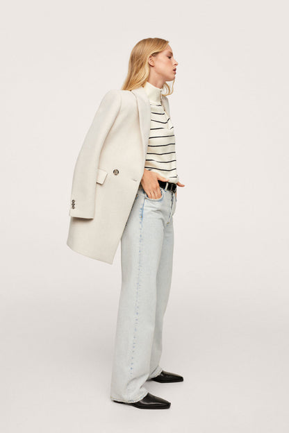 Light grey blazer side view with notch lapel and two-button front