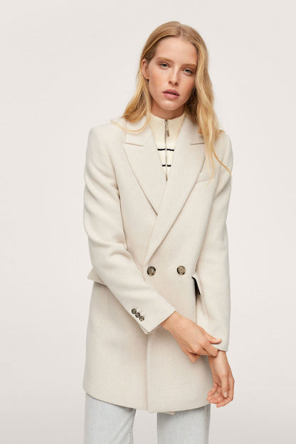 Light grey double-breasted blazer with notch lapels and metallic button cuffs