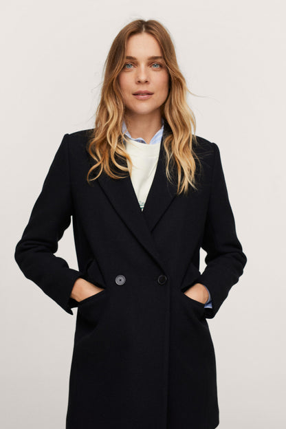 Black double-breasted coat with notched lapels and button closure, side pockets