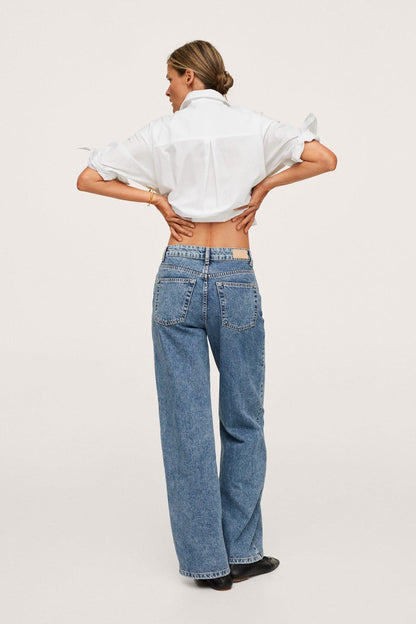 Back view of medium-blue straight-leg denim jeans with patch back pockets