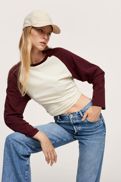 Medium-blue high-rise denim jeans with button fly and classic five-pocket design
