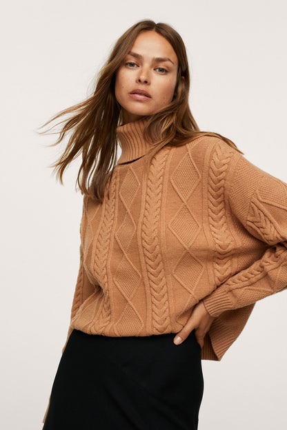 Women’s camel cable-knit turtleneck sweater with raised knit texture