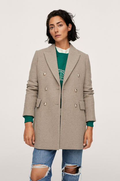 Women's taupe blazer with gold double-breasted buttons and flap pockets