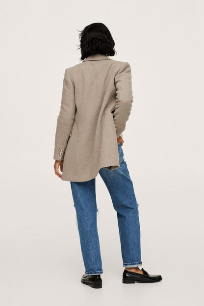 Women's taupe blazer back view with long sleeves and button closure