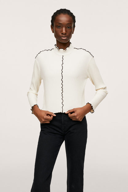 Ecru long-sleeve knit top with stand collar and vertical ruffle placket