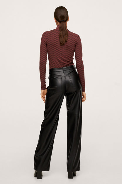 Burgundy patterned high-neck top, long sleeves, paired with black leather trousers