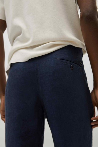 Dark navy jeans pocket and button closure with side welt pocket detail