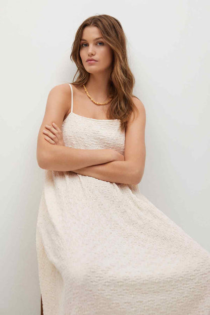 Ecru textured maxi sundress with spaghetti straps and square neckline, side slit