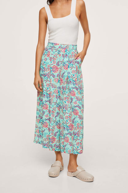 White sleeveless scoop-neck tank and blue-pink floral wide-leg midi culottes