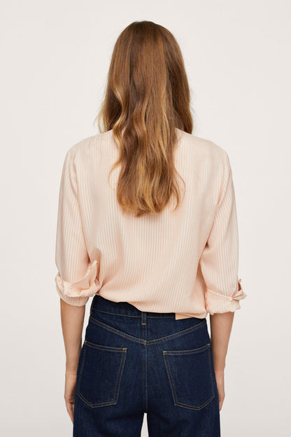 Back view: ivory white striped hooded top with drawstring, long sleeves