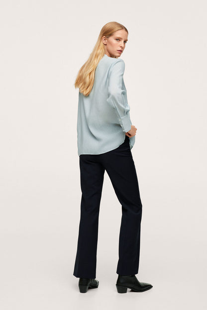 Light blue striped blouse, long sleeves and button cuffs
