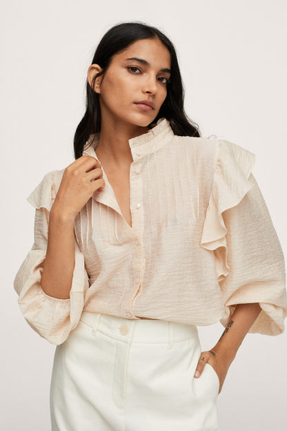 Ecru ruffle-sleeve blouse with ruffled trim and partial button placket