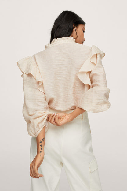 Ecru ruffle-sleeve blouse, back view with gathered shoulder detail