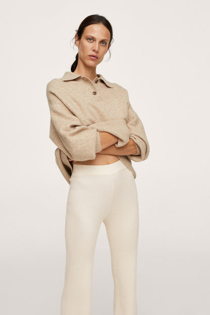 MANGO vanilla cropped knit sweater with collar and button placket, paired with cream pants