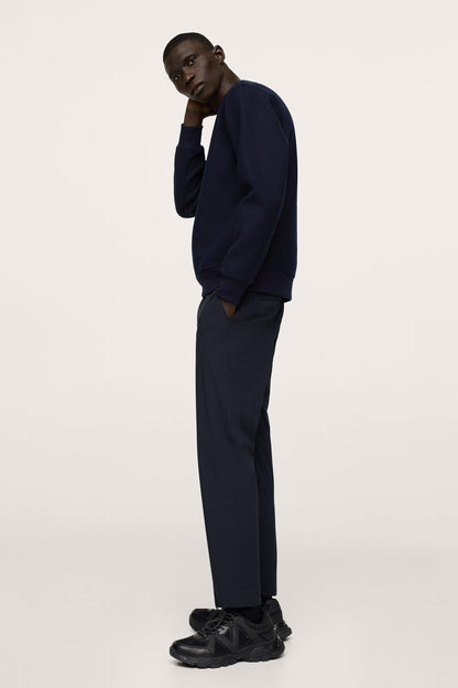 Dark navy sweatshirt and pants set, front view with crew neckline and cuffed sleeves.