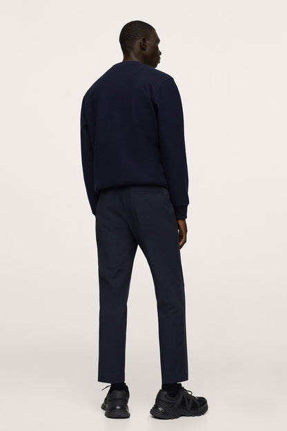 Dark navy sweatshirt and pants set, back view with crew neck and straight-leg pants.