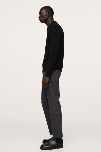 Dark heather grey straight-leg trousers with plaid check, side view.