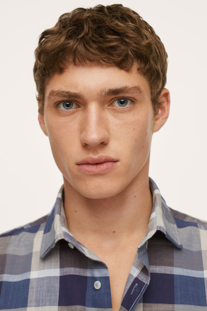 Men's short-sleeve plaid button-up shirt, navy blue and gray, buttoned collar close-up