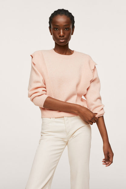 Pastel pink knit crewneck sweater with dropped shoulders and ribbed cuffs