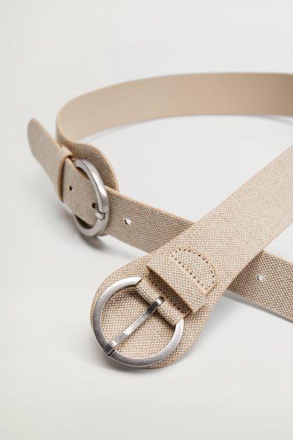 Sand woven belt detail with silver double-ring buckle and stitched holes