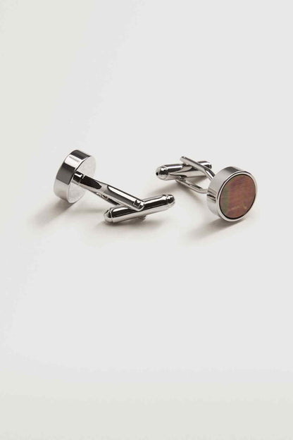 MANGO cufflinks pair with round iridescent discs and hinged polished silver bars