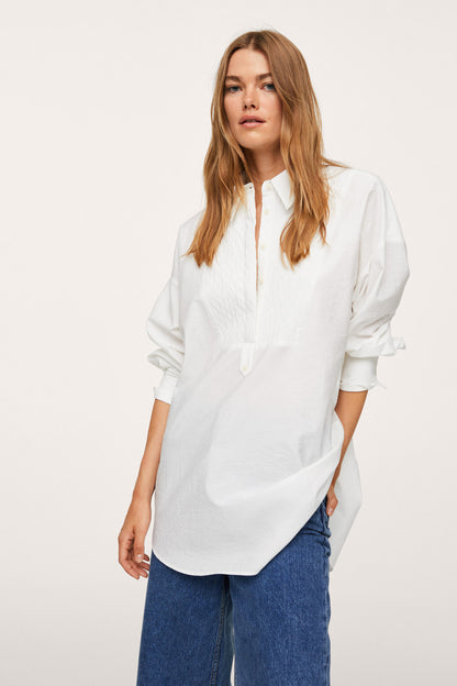 Off-white long-sleeve blouse with V neckline, front view
