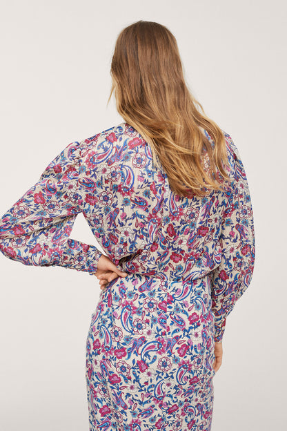 Floral patterned off-white long-sleeve blouse with gathered waist