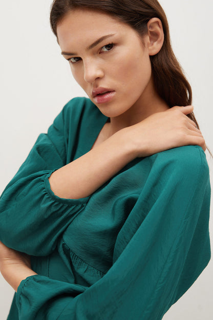 Teal green peasant blouse with gathered neckline and long puff sleeves