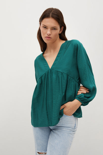 Teal green blouse with V neckline and long puff sleeves