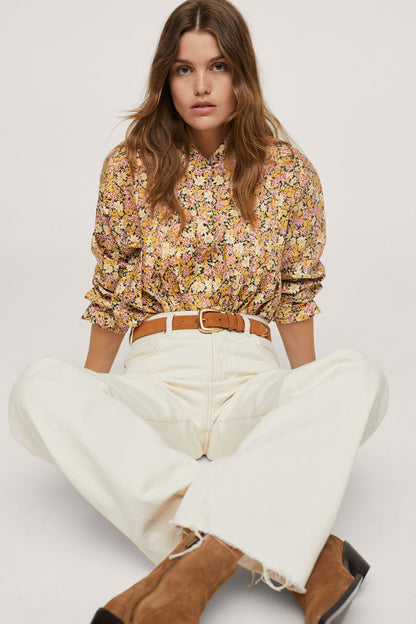 Yellow floral puff-sleeve blouse with gathered cuffs and V-neck