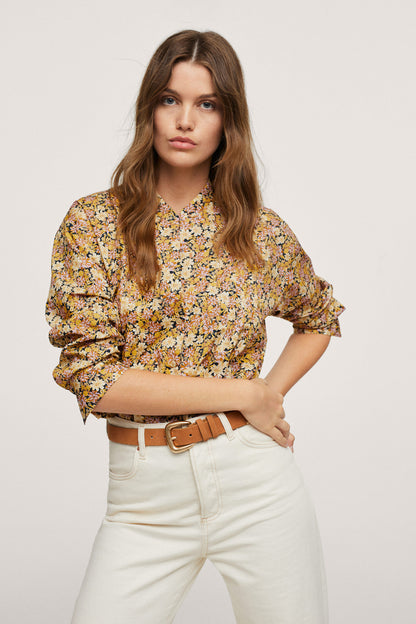 Yellow floral blouse with long puff sleeves and V-neck