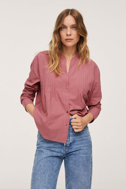 Maroon button-up blouse with rolled long sleeves and center button placket
