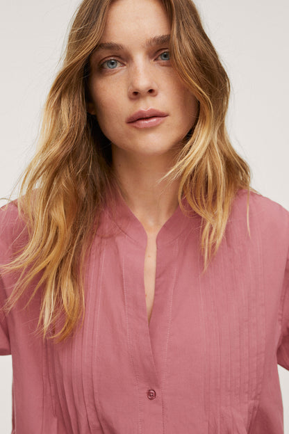 Maroon button-up blouse with short sleeves and V-neck placket