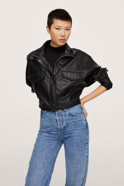 Black leather jacket with high collar and zip front, worn with blue jeans