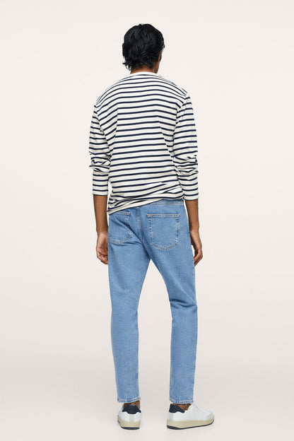 Off-white and navy striped long-sleeve crewneck shirt, back view