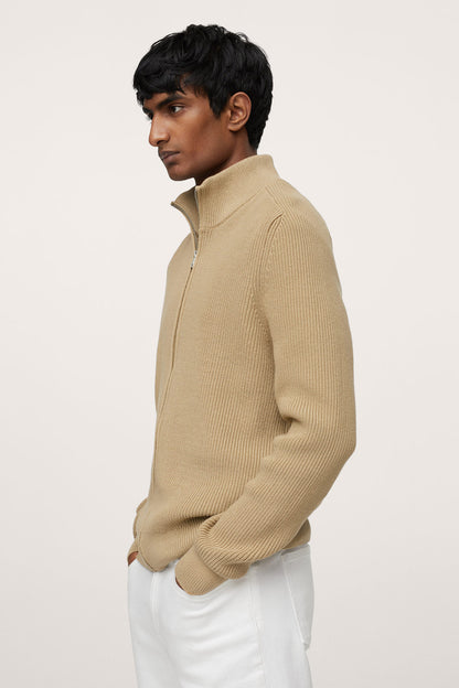 Beige ribbed knit zip-up sweater side view with full zipper