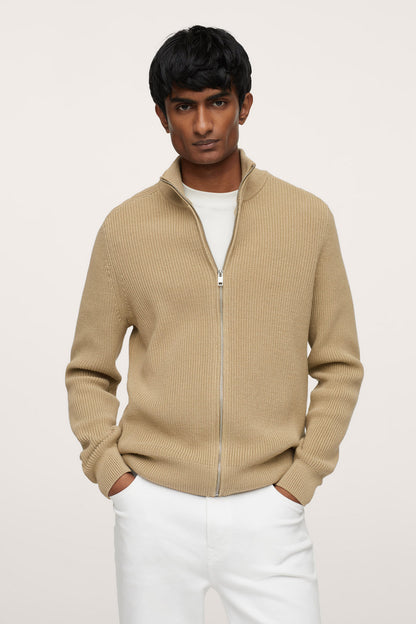 Beige ribbed knit zip-up sweater with stand collar and full zipper