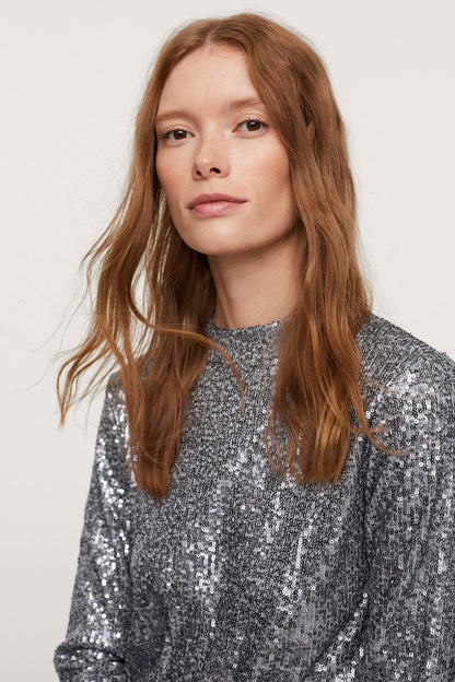 Silver sequin long-sleeve top close-up of crew neckline