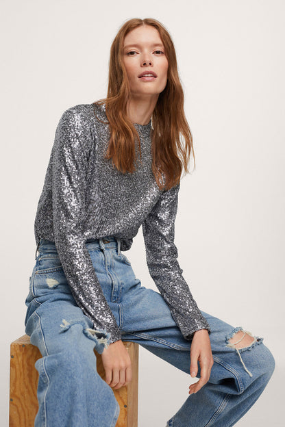 Silver sequin long-sleeve top with sparkling textured surface