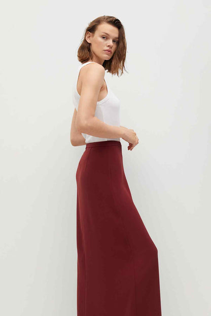 Maroon high-waist maxi skirt, side view