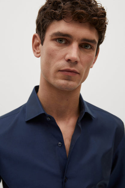 Men's navy button-up shirt, collared neckline, close-up