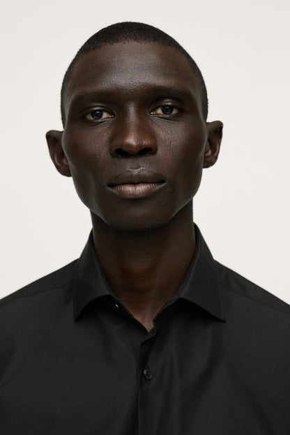 Black button-up dress shirt, long sleeves with pointed collar