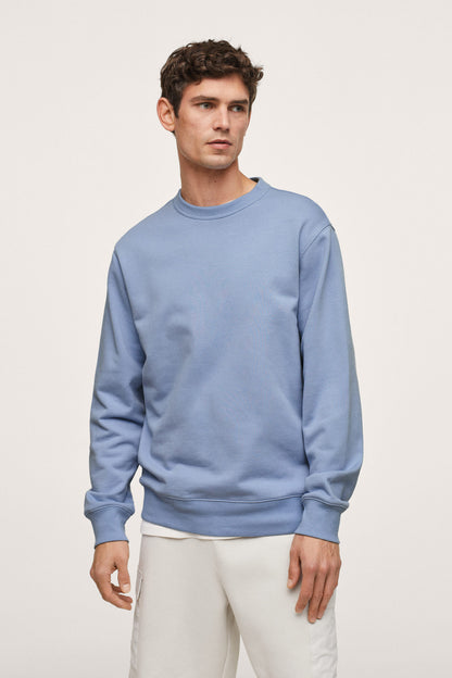 Sky blue crewneck sweatshirt with long sleeves and ribbed cuffs